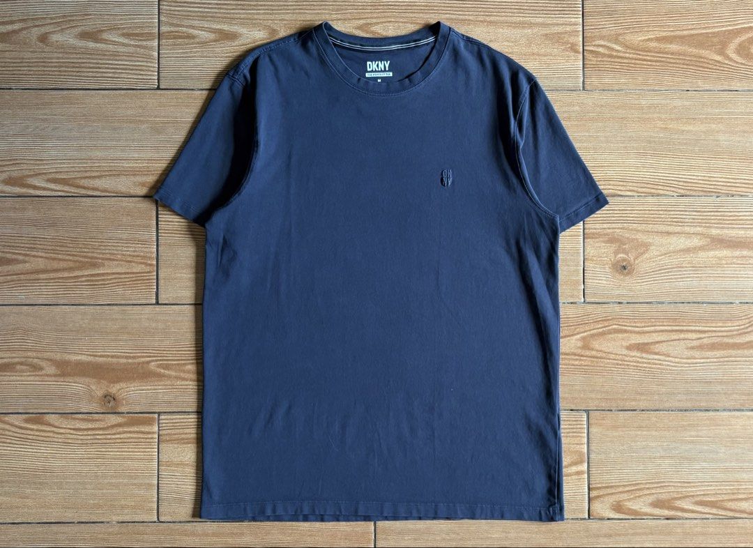 DKNY THE PERFECT TEE EMBROIDERED CHEST LOGO (Category: Shirts) located in Baras. Submitted by jnc__apparel (Listing ID 1466907969, Image 1). Description: 🏷️ DKNY THE PERFECT TEE EMBROIDERED CHEST LOGO 📌 Dimes: 26L x 20.5W 📌 Size: Medium on tag best fit XL for womens 📌 Condition: Excellent 📌 Color rate: 9.5/10 📌 Issue: None ✅ Washed and ready to wear.