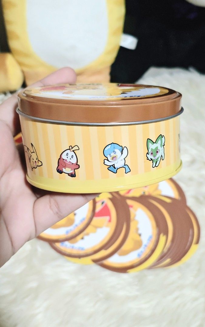 DOBBLE POKÉMON CARD GAME (Category: Other Merchandise) located in Manila. Submitted by yourfavoritethings7 (Listing ID 1466932976, Image 3). Description: circular card - 55 pcs Tin can cover - with tape marks.