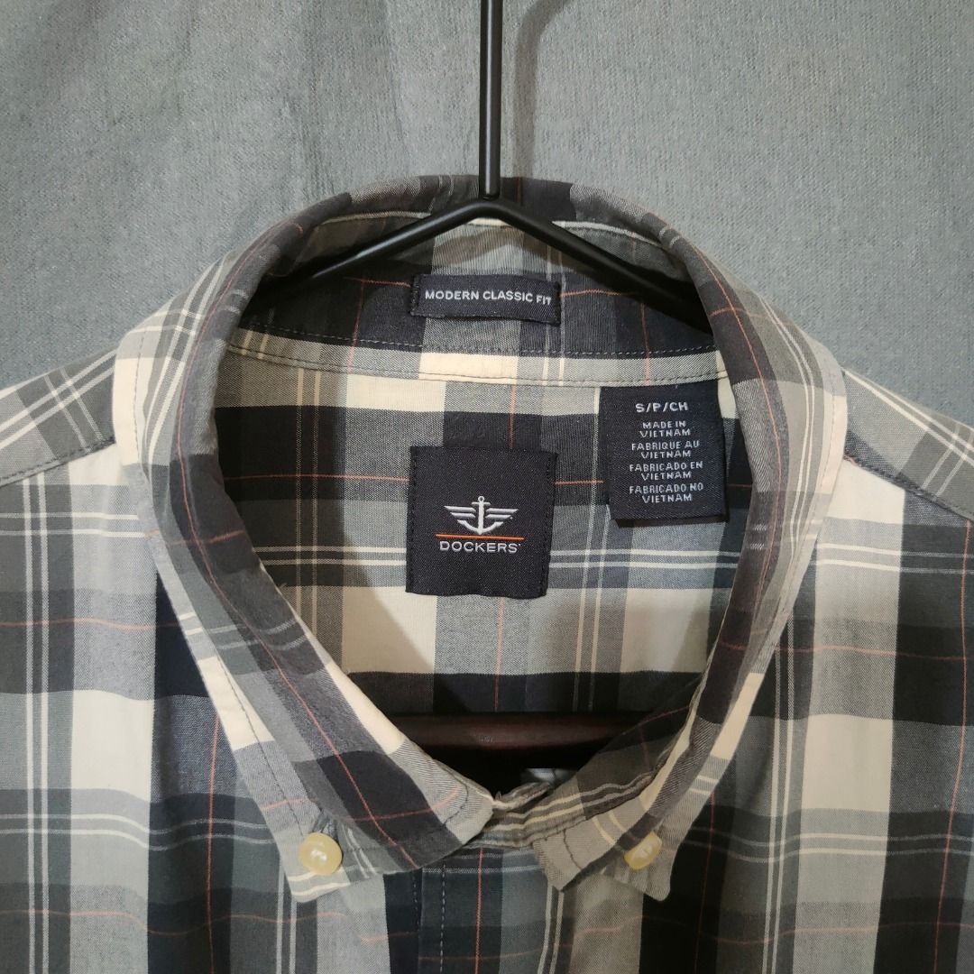 Dockers plaid button-down shirt (modern classic fit) (Category: Formal Shirts) located in Makati City. Submitted by Xerberus (Listing ID 1466799913, Image 3). Description: This is a Dockers modern classic fit plaid button-down shirt in a gray, black, and off-white pattern. The sizing tag "S / P / CH" on your Dockers shirt indicates that it is a men's Size Small translated for different regional markets: • S = Small (English) • P = Petit (French f