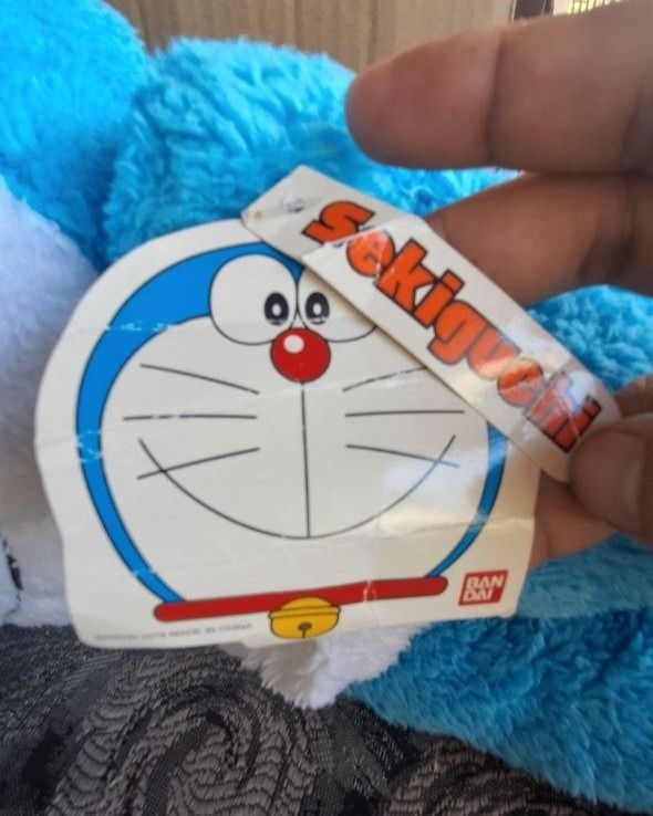 Doraemon – Sekiguchi Laying Sleeping Big Plush (Category: Plushies & Soft Toys) located in Paombong. Submitted by revox.store (Listing ID 1465550115, Image 2). Description: Sekiguchi • Doraemon • Big Plush Included: ✓ Doraemon laying plush with smiling closed-eye expression and collar bell (~40 cm) ✓ Original Sekiguchi paper hang tag attached Flaws: • Cloth tush tag is absent/removed • Original paper hang tag is heavily creased 📍 On-hand (Paombo
