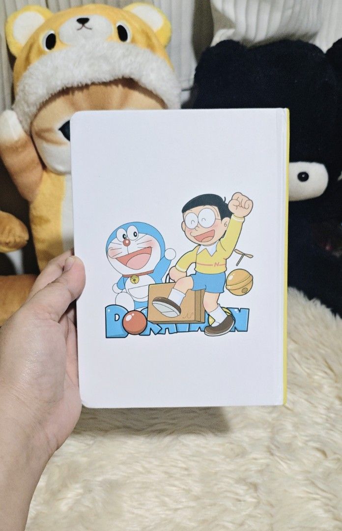 DORAEMON NOTEBOOK (Category: Stationery & School Supplies) located in Manila. Submitted by yourfavoritethings7 (Listing ID 1466897031, Image 2). Description: Number of pages not indicated. Hard cover..