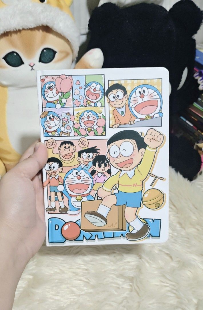 DORAEMON NOTEBOOK (Category: Stationery & School Supplies) located in Manila. Submitted by yourfavoritethings7 (Listing ID 1466897031, Image 1). Description: Number of pages not indicated. Hard cover..