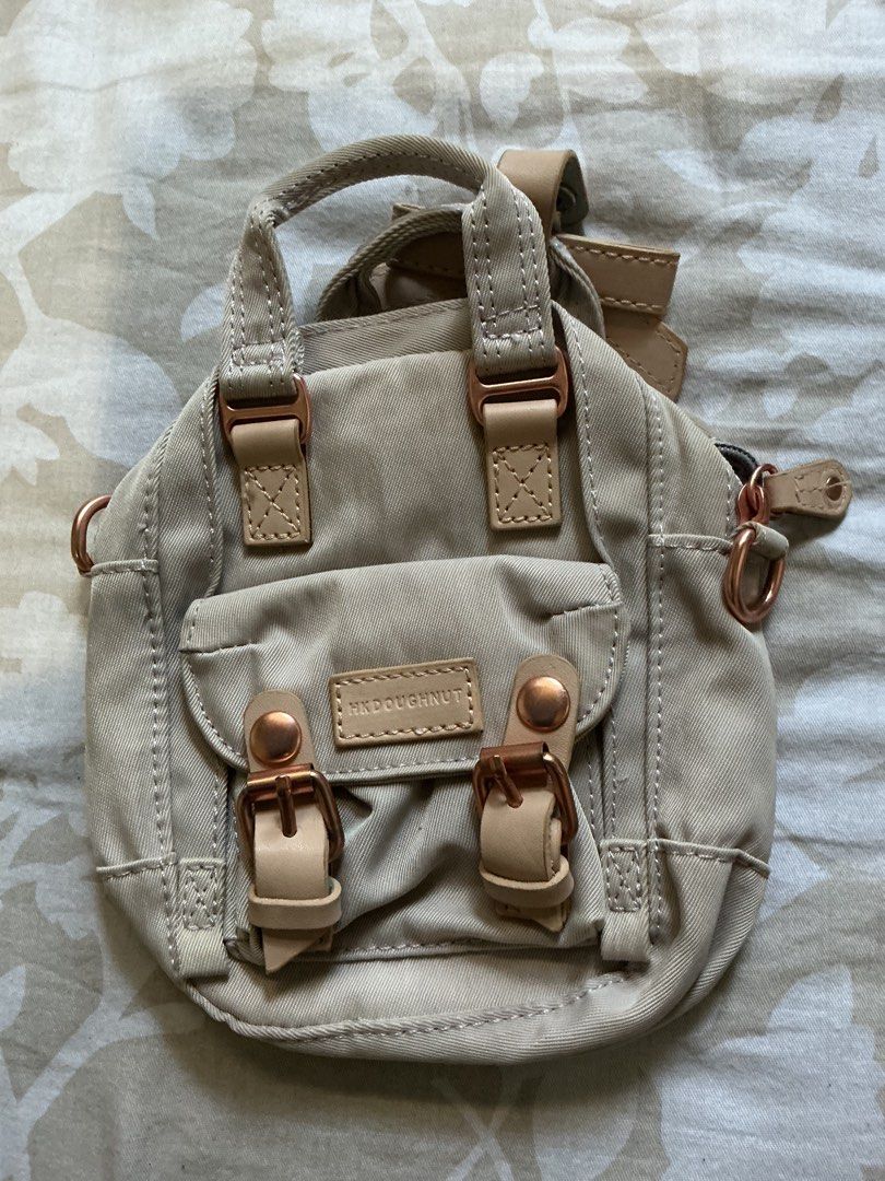 Doughnut mini sling bag (Category: Purses & Pouches) located in Angeles City. Submitted by goodbuysathome (Listing ID 1466904731, Image 1). Description: Like new without sling/strap Doughnut small pouch Add sf 55. Gcash payment .