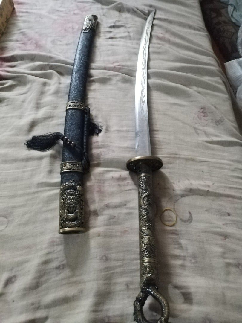 Dragon ring sword 1060 metal (Category: Vintage Collectibles) located in San Rafael. Submitted by jflshoppe1989 (Listing ID 1466266914, Image 1). Description: Real dragon katana sword *40 inches lenght *2kilo ang bigat ng sword nya * Brass ang kanyan handle * Mga nka embose ang details nya *Reel steel blade *Maganda hindi ka mgsisi *Good for collection Price 9500 plus shipping Mas ok Lalamove pick up Contact number 09976703787.