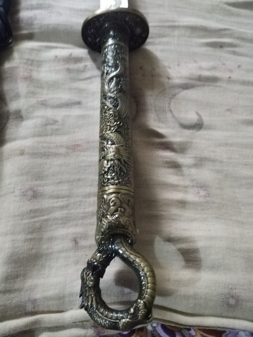 Dragon ring sword 1060 metal (Category: Vintage Collectibles) located in San Rafael. Submitted by jflshoppe1989 (Listing ID 1466266914, Image 3). Description: Real dragon katana sword *40 inches lenght *2kilo ang bigat ng sword nya * Brass ang kanyan handle * Mga nka embose ang details nya *Reel steel blade *Maganda hindi ka mgsisi *Good for collection Price 9500 plus shipping Mas ok Lalamove pick up Contact number 09976703787.