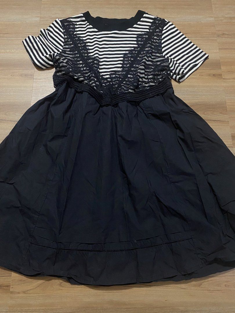 Dress L-semi XL🤍 (Category: Dresses) located in Bulacan. Submitted by Spothings (Listing ID 1466948751, Image 1). Description: Length: 33" With two side pockets Super black in person - Style: Short sleeve dress with slip-on design - Pattern & Design: Black and white stripes on top with a chic black lace V-shape overlay - Skirt: Flared bottom featuring a stitched hem detail - Neckline: Classic crew neck - Material: Lightweight and comfortable fab