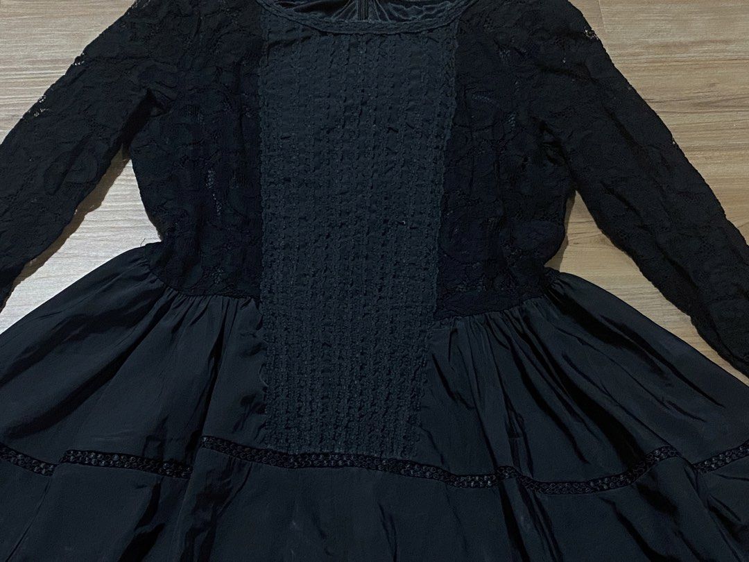 Dress M-L🤍 (Category: Dresses) located in Bulacan. Submitted by Spothings (Listing ID 1466949948, Image 2). Description: Front length:34" Back length:39" - Elegant black long-sleeve dress - Beautiful floral lace bodice with a textured center panel - Flared skirt with layered inner lining for nice volume - Trendy high-low hem (knee-length front, longer back drape) - Secure zipper closure at the back neck - Perfect for parties, dinners, or semi-fo