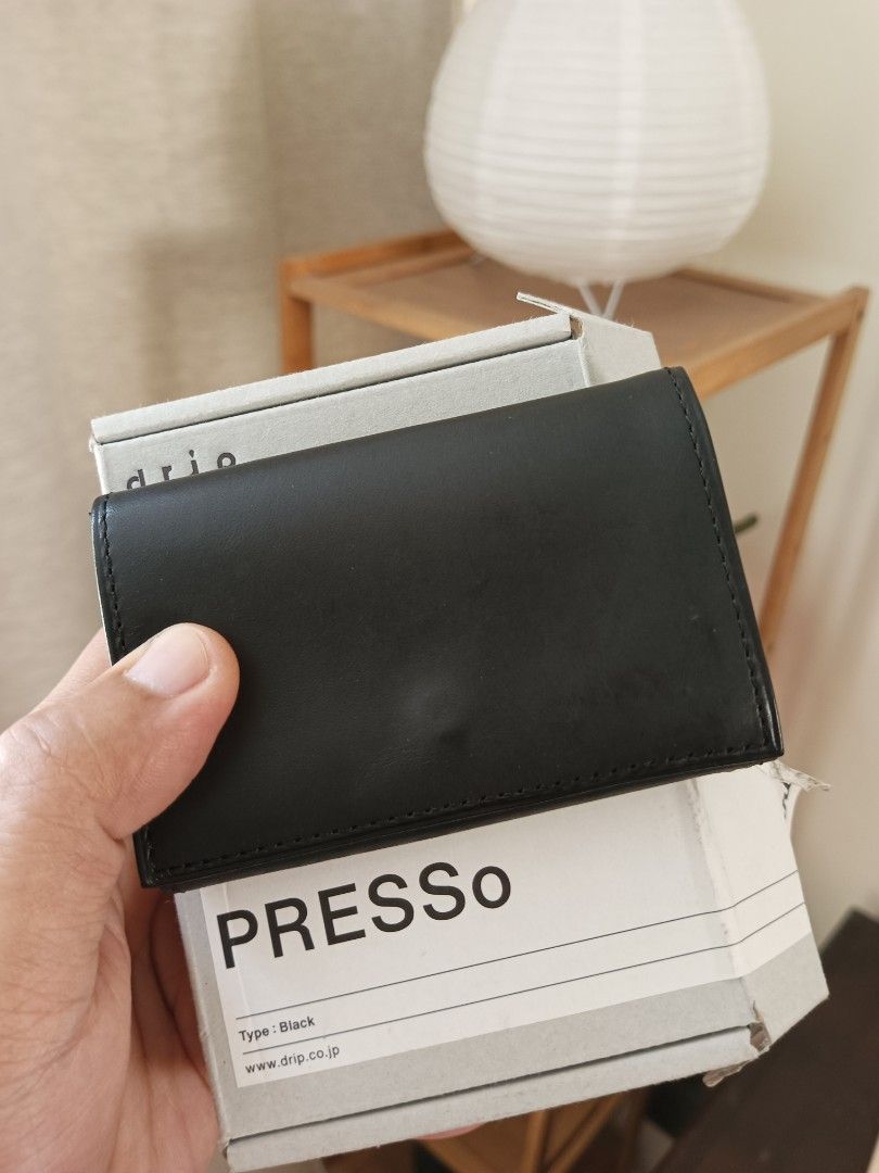 Drip Presso wallet Made in Japan (Category: Wallets & Card Holders) located in Manila. Submitted by archived.333 (Listing ID 1466813018, Image 1). Description: Price 1.7k (5k orig price) Drip presso -Black -Made in japan -Aged Cow Leather -Bought for 80 USD or 5k pesos, selling for 1.7k -complete inclusions -Really nice in person nice with your redwing , selvedge, momotaro gucci Louis vuitton and alden or Balenciaga .