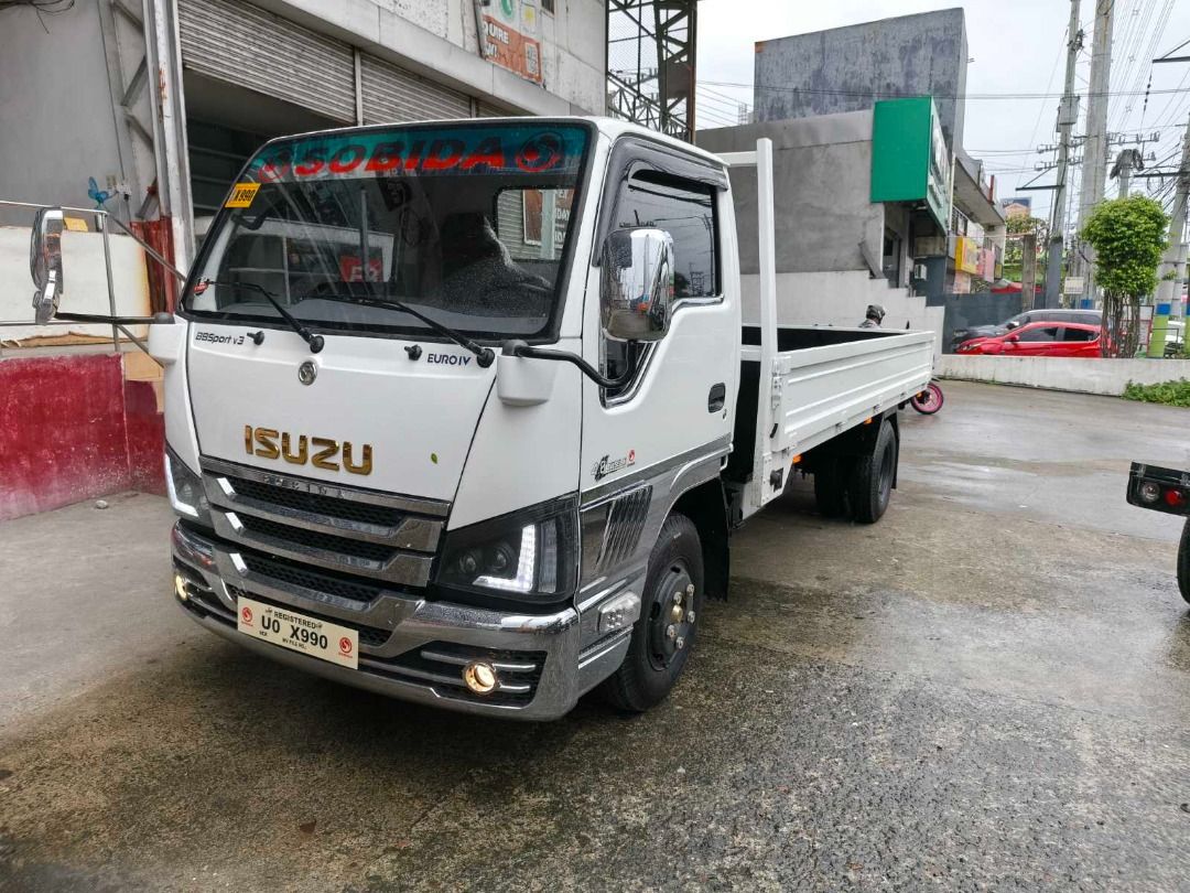 Drop Side Truck Double Tire (Category: Heavy Vehicles) located in Caloocan City. Submitted by sobidamotorscorp_cavite (Listing ID 1466780944, Image 1). Description: ✅Body Type: Dropside (Standard) ✅Engine: 4HL1, Euro IV, CRDI, 138Hp, 4.8L, Diesel Engine ✅Length: 14ft. ALSO AVAILABLE IN: Different Lengths, Body, Engine, Tire ✅1-Year Warranty ✅ Euro 4 Engines (Government Compliant – Republic Act 8749, Clean Air Act of 1999) ✅ Current Year Model (20