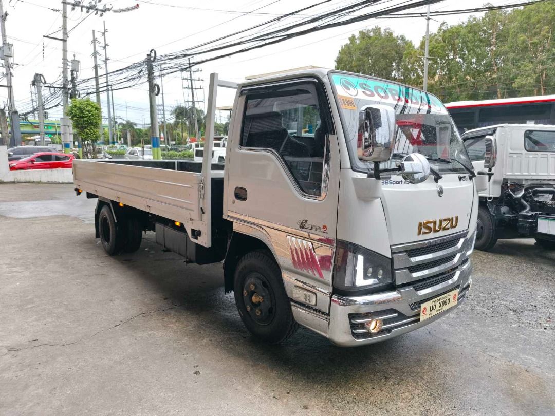 Drop Side Truck Double Tire (Category: Heavy Vehicles) located in Caloocan City. Submitted by sobidamotorscorp_cavite (Listing ID 1466780944, Image 2). Description: ✅Body Type: Dropside (Standard) ✅Engine: 4HL1, Euro IV, CRDI, 138Hp, 4.8L, Diesel Engine ✅Length: 14ft. ALSO AVAILABLE IN: Different Lengths, Body, Engine, Tire ✅1-Year Warranty ✅ Euro 4 Engines (Government Compliant – Republic Act 8749, Clean Air Act of 1999) ✅ Current Year Model (20