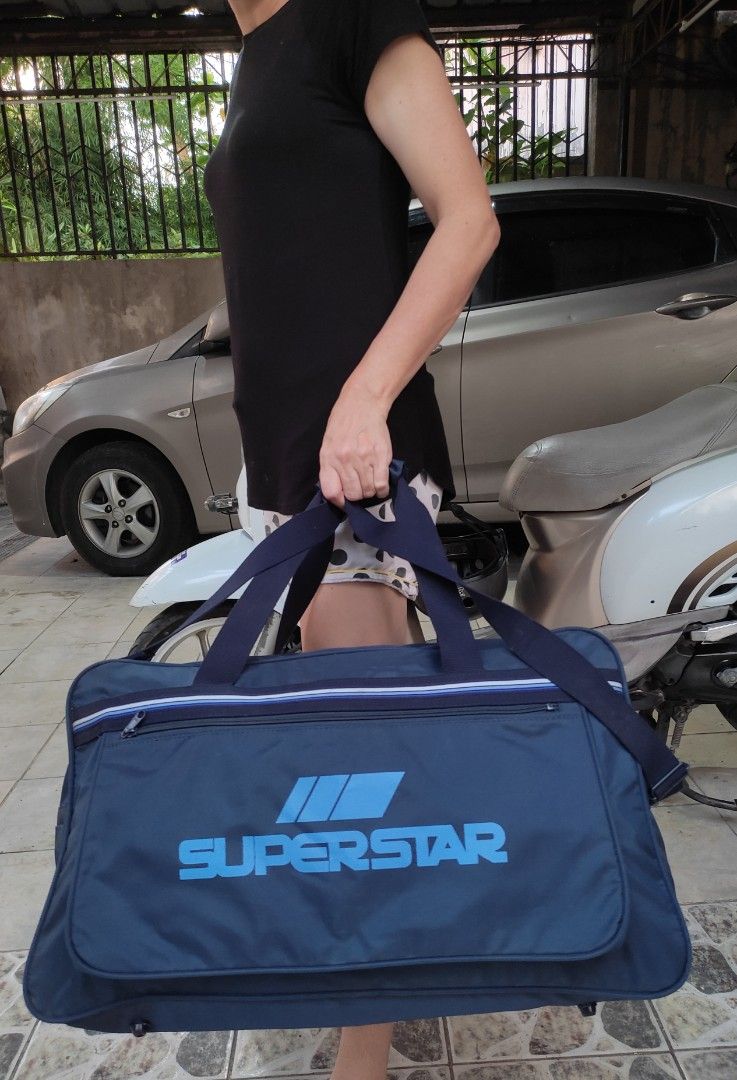 Duffle bag (Category: Sling Bags) located in Cainta. Submitted by allauthenticbymj (Listing ID 1466912847, Image 1). Description: Brand: SUPERSTAR large travel/duffle bag L22"/H15"/W10" 2 way NAVY BLUE duffle bag No issue Price:750 ***buyer shoulders sf LOCATION: CAINTA Courier choices and MOP Gogo express (cod option) LBC (pay sf first-- cop for the item's amount) J&t (gcash payment) Lalamove for same day delivery Gcash payment.