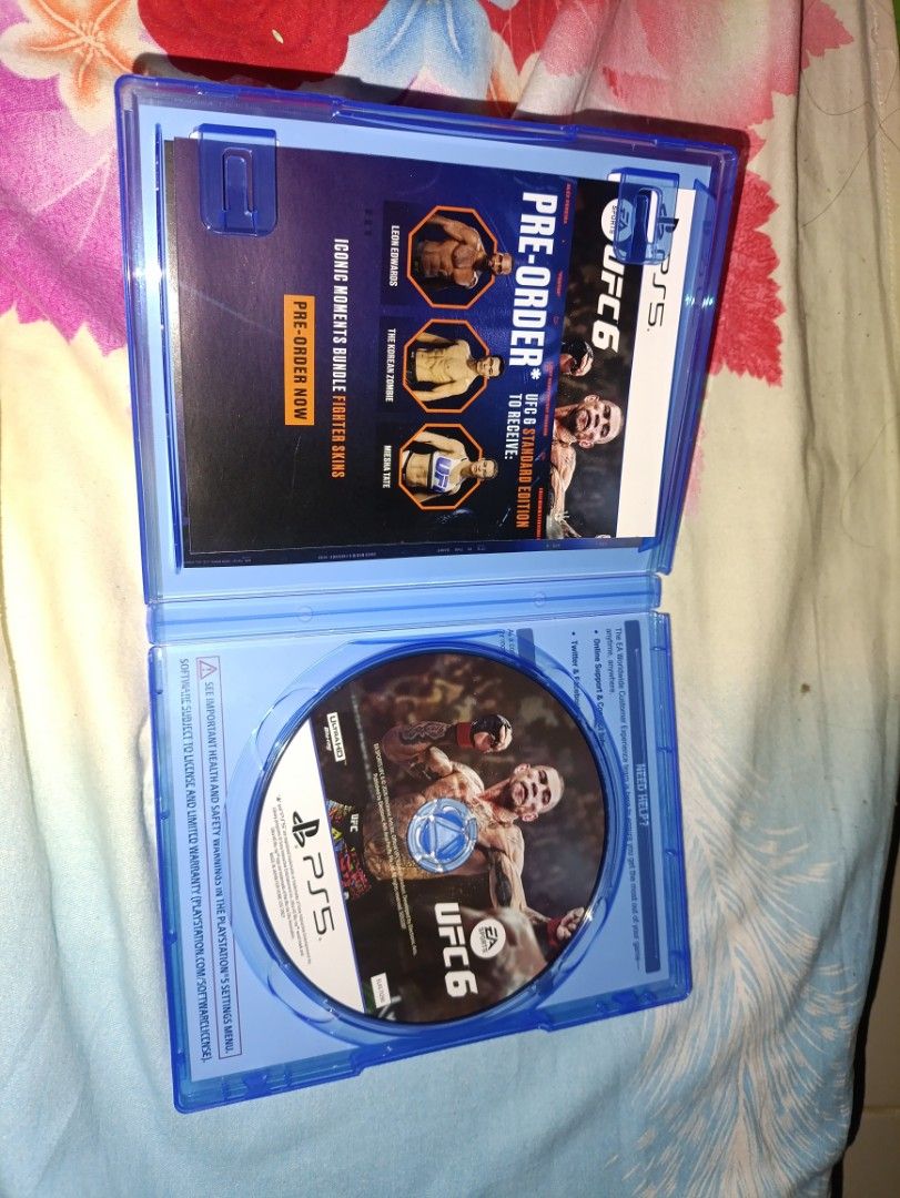 EA Sports UFC 6 PS5 Game (Category: PlayStation) located in San Fernando. Submitted by rhainier-ibanez-321 (Listing ID 1466834109, Image 2). Description: - Game: EA Sports UFC 6 for PlayStation 5 (Standard Edition) - Condition: Original blue case and disc, ready for delivery - Inclusions: Includes pre-order insert flyer inside the cover - Rating: M18 - Language: Supports both English and Chinese subtitles *unsed code*.