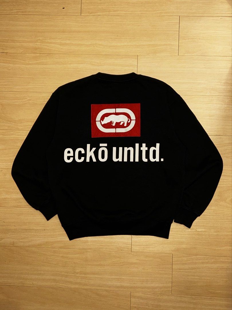 Ecko Unltd Black Sweatshirt with Red Logo Patch (Category: Coats, Jackets and Outerwear) located in Manila. Submitted by sevyph (Listing ID 1466795202, Image 1). Description: Excellent condition 21 x 25 .
