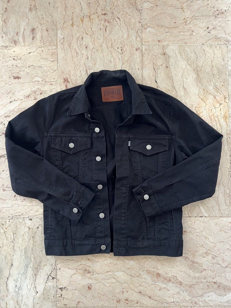 Edwin Trucker Black Denim Jacket Men (Category: Coats, Jackets and Outerwear) located in San Jacinto. Submitted by rex_finds (Listing ID 1466827180, Image 1). Description: Edwin Trucker Black Denim Jacket Men 100 % Authentic 💯💯💯 Color rate: 10/10 Black Size: Small Dimes: 17.5 x 21 inches Armpit to pit: 20 inches Best fit: Small to medium Excellent condition . Like new No issue Complete buttons Price is negotiable Feel free to give a reasonable