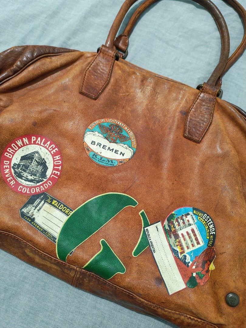 Eighty twenty travel decal leather bag (Category: Briefcases) located in Baguio. Submitted by used_clothing2600 (Listing ID 1466896989, Image 3). Description: Eighty twenty travel decal leather bag Good condition signs of usage width 20 length 14 P 1,680.