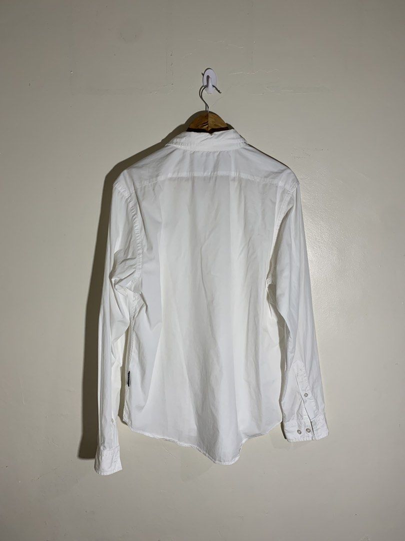 Emporio armani longsleeves (Category: Formal Shirts) located in Lapu Lapu. Submitted by fellasgallery11 (Listing ID 1466850787, Image 2). Description: Emporio armani longsleeves 23.5 width 29 length Excellent condition No issues or flaws .