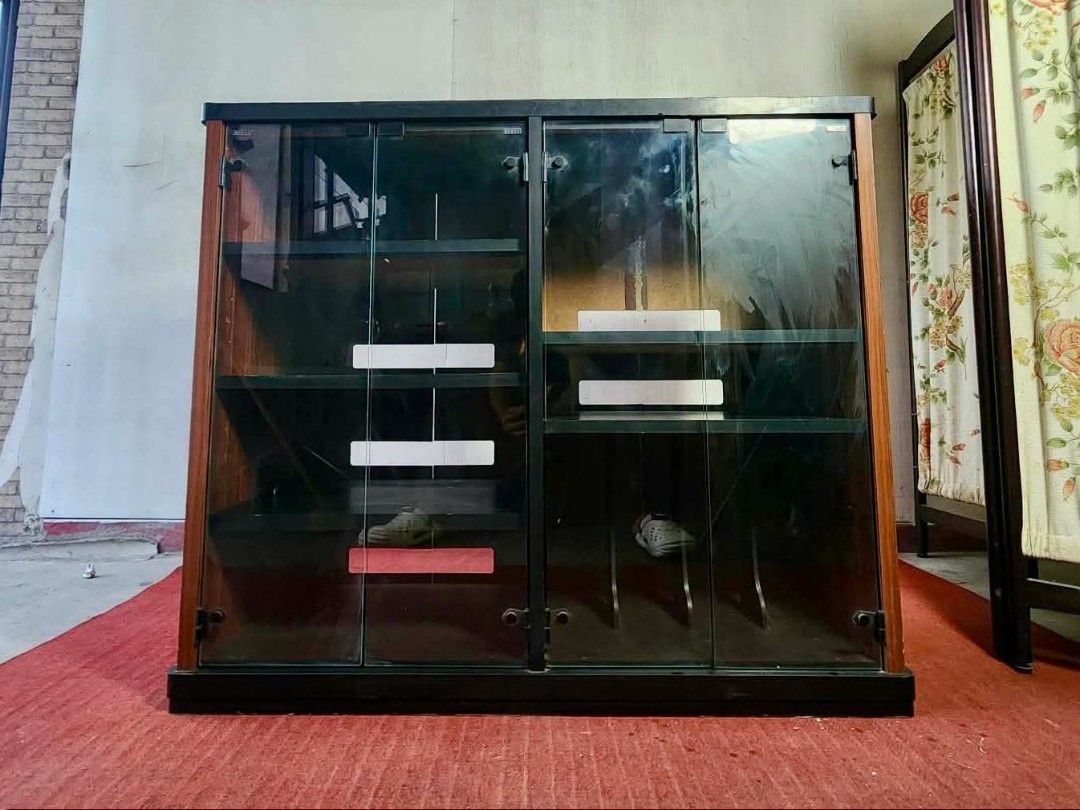 Entertainment Rack (Category: Shelves, Cabinets & Racks) located in Meycauayan. Submitted by marygracecasimiro (Listing ID 1466896555, Image 2). Description: Glass Door Entertainment Rack 44”L x 17”W x 37”H Php 4,900🩷.