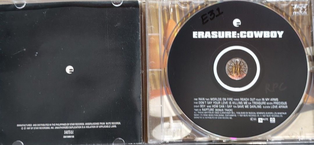 Erasure Cowboy CD Album (Category: CDs & DVDs) located in Manila. Submitted by ruelcabrer77078 (Listing ID 1466879922, Image 3). Description: - Artist & Album: Erasure - Cowboy Audio CD - Label: Mute Records (Manufactured and distributed in the Philippines by Star Records) - Inclusion: Jewel case and full tracklist printed on the disc surface - Condition/Appeal: Great addition for 90s synth-pop music fans and collectors.
