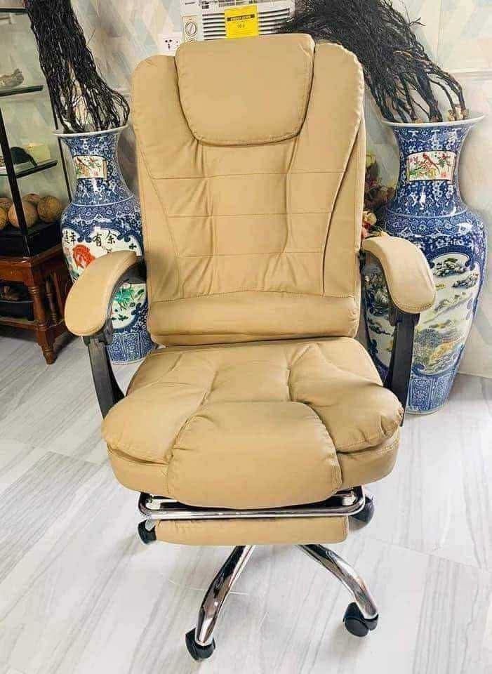 Ergonomic Executive Office Chair with Footrest (Category: Office Furniture & Fixtures) located in Caloocan City. Submitted by swiftflower_802790 (Listing ID 1466947949, Image 1). Description: - Ergonomic high-back executive chair designed for long working hours - Built-in retractable footrest for maximum comfort and relaxation - Thick cushioning on the seat and headrest for superior support - Smooth-rolling caster wheels and a sturdy, durable chr