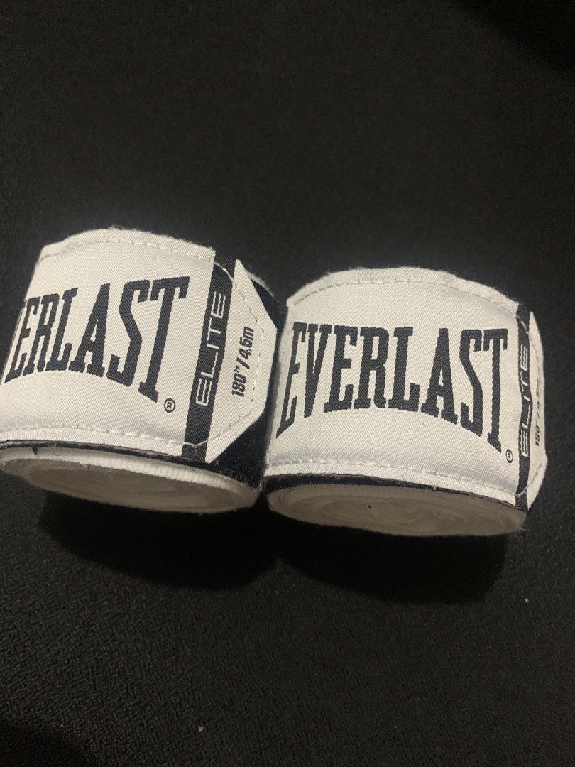 EVERLAST elite hand wrap 180in (Category: Combat Sports) located in Manila. Submitted by santanajdd (Listing ID 1466834113, Image 3). Description: Everlast Elite Hand Wrap 🥊 * clean white w/ black branding * standard 180in 4.5m * ideal and durable for Boxing, Muay Thai, and general training.