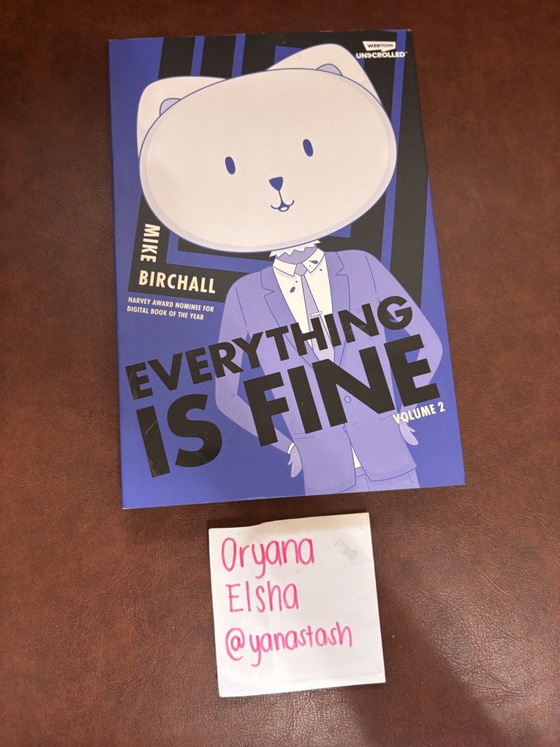 Everything Is Fine Volume 2 by Mike Birchall Webtoon Unscrolled (Category: Comics & Manga) located in Manila. Submitted by yanastash (Listing ID 1466809725, Image 2). Description: - Title: Everything Is Fine Volume 2 by Mike Birchall - Publisher: Webtoon Unscrolled - Edition: Harvey Award Nominee for Digital Book of the Year - Cover: Blue artwork featuring the main character with a giant cat head in a suit - Condition: Clean pages and sharp corne