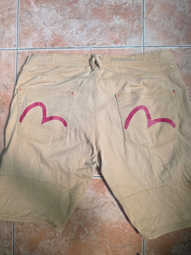Evisu Tan Cargo Shorts Size 34 (Category: Shorts) located in Quezon City. Submitted by mallio112 (Listing ID 1466884606, Image 2). Description: Evisu tan utility shorts in size 34. Made from 99% cotton and 1% spandex blend for stretch and comfort. Classic Evisu branding tags on front and back pockets. .
