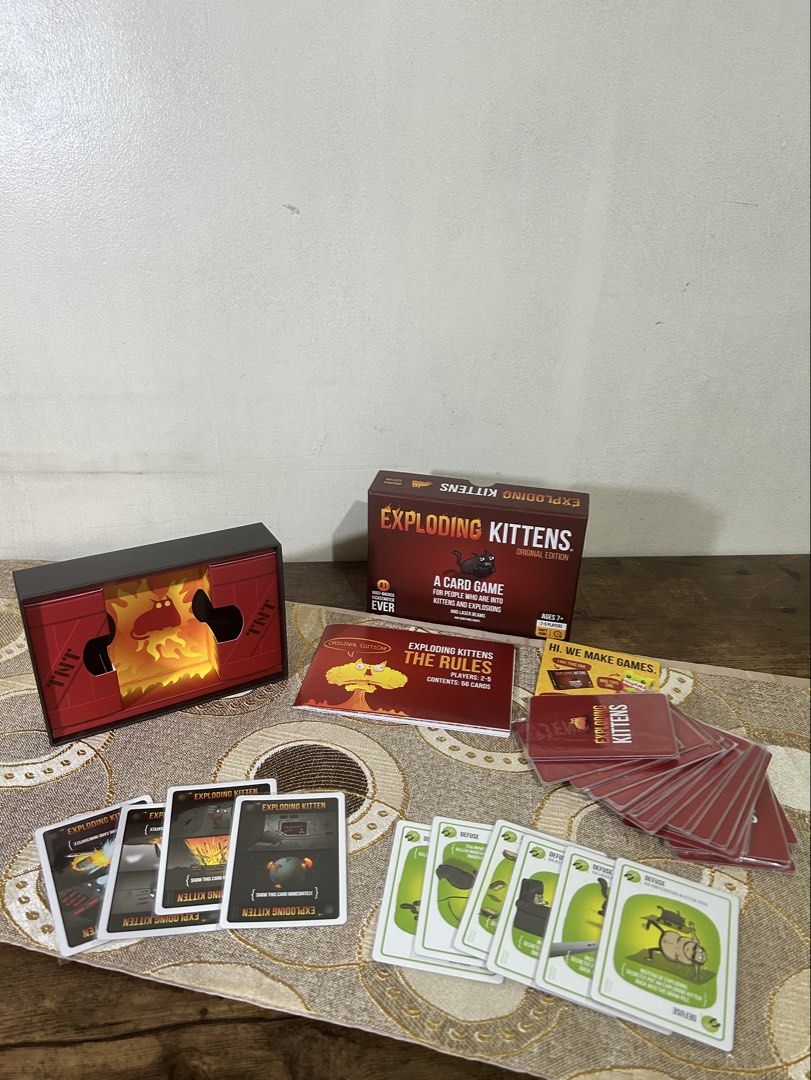 Exploding Kittens Original Edition Card Game | Complete + Sleeved (Category: Board Games & Puzzles) located in Pasig City. Submitted by ro1yel (Listing ID 1466802873, Image 2). Description: Original Exploding Kittens: Original Edition card game. Complete 56-card set, with all cards individually sleeved for protection. Original Exploding Kittens: Original Edition card game, purchased from GeekBox.PH for ₱1,650. Proof of purchase available upon req
