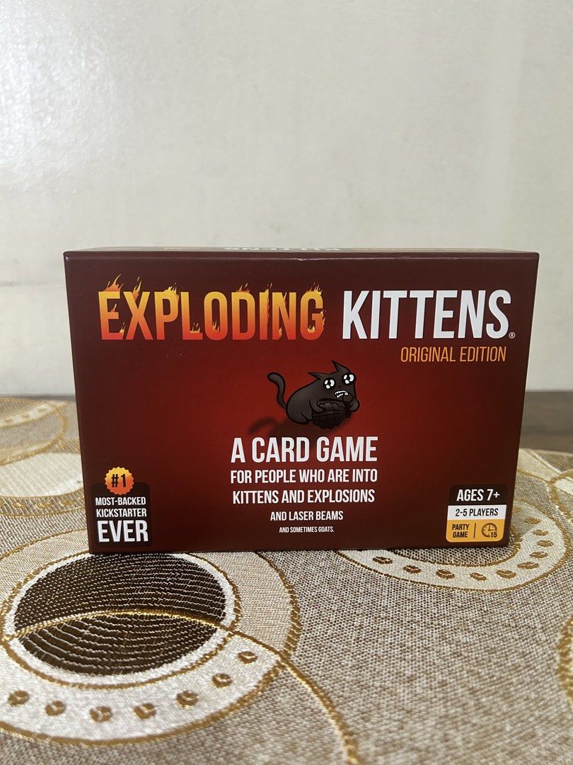 Exploding Kittens Original Edition Card Game | Complete + Sleeved (Category: Board Games & Puzzles) located in Pasig City. Submitted by ro1yel (Listing ID 1466802873, Image 1). Description: Original Exploding Kittens: Original Edition card game. Complete 56-card set, with all cards individually sleeved for protection. Original Exploding Kittens: Original Edition card game, purchased from GeekBox.PH for ₱1,650. Proof of purchase available upon req