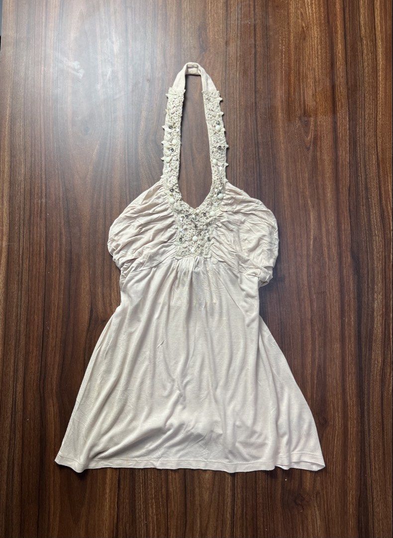 Express Beige Beaded Halter Top Size S (Category: Sleeveless) located in Oroquieta. Submitted by zjstg (Listing ID 1466870982, Image 1). Description: - Brand/Style: Express beige halter top - Size: Small - Material: Soft knit fabric with pleated bodice detailing - Accents: Beaded and sequined lace embroidery on neckline and straps - Fit: Backless with a flowy, relaxed silhouette - Origin: Made in the Philippines - Ideal for: Summer outings or cas