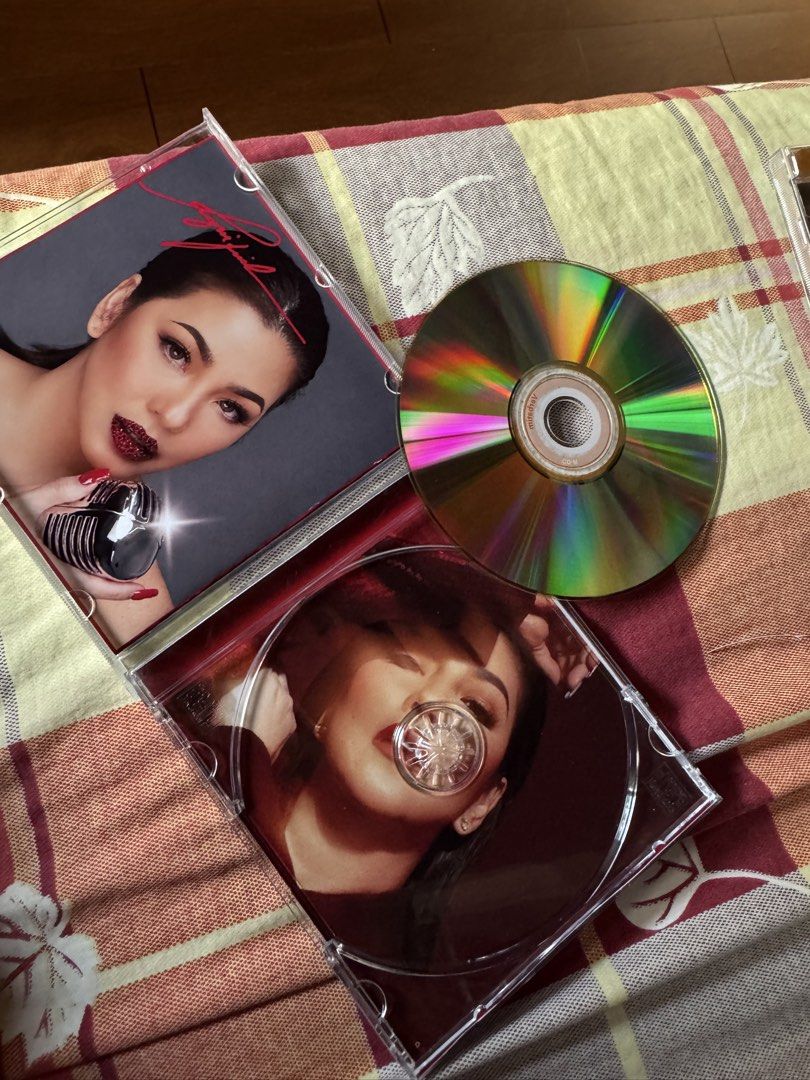 Fan Made Reginified. (Category: CDs & DVDs) located in Manila. Submitted by markdarwin18477 (Listing ID 1466861429, Image 3). Description: - Artist/Album: Sarah Geronimo Studio Album on CD - Condition: Plastic jewel case in good shape, opens cleanly - Playback: Tested and plays smoothly without skipping - Inclusions: Comes with printed booklet featuring a retro microphone theme - Perfect for: OPM music collectors and Popstar Royalty fans.