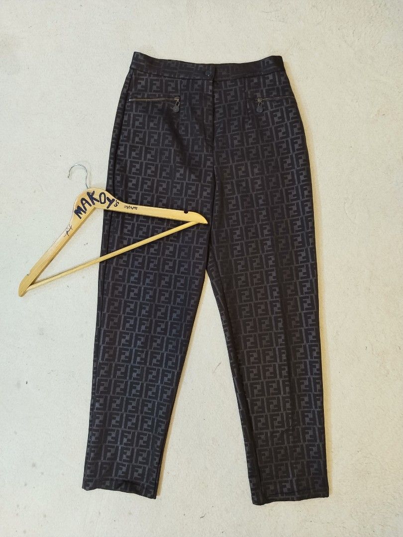 Fendi Jeans Monogram Zipped Pants (Category: Jeans) located in Davao. Submitted by Mac_koyz (Listing ID 1466905920, Image 1). Description: - Authentic vintage Fendi Jeans pants in dark brown - Iconic all-over FF monogram pattern - Straight leg fit with stylish zipper pocket details on both sides - Size L (Made in Italy) - Material: 80% polyester, 20% spandex for great stretch and comfort - Care: Hand wash only.