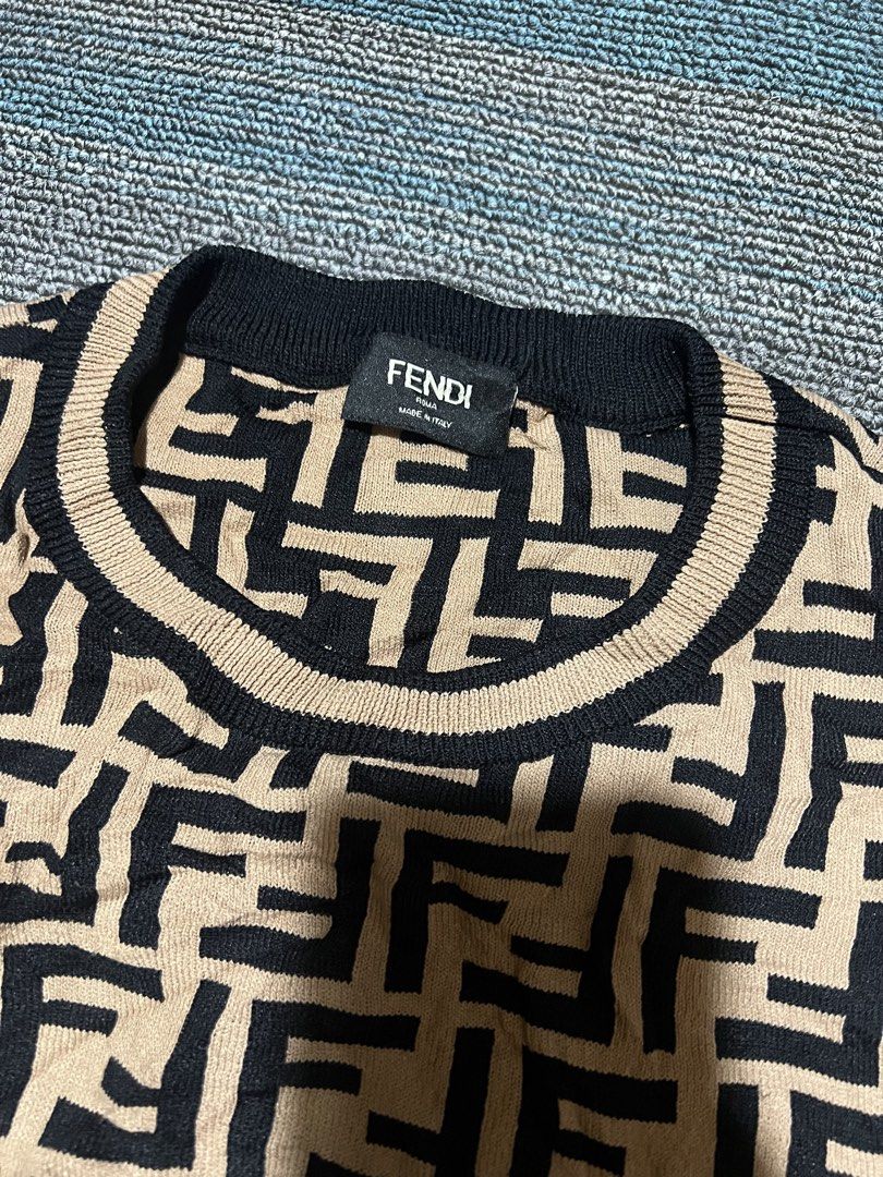 Fendi knitted shirt (Category: Blouses) located in Cebu City. Submitted by mark24anth29233 (Listing ID 1466891053, Image 2). Description: Size: Medium Dimes: see details Excellent condition Issue: cut wash tag.