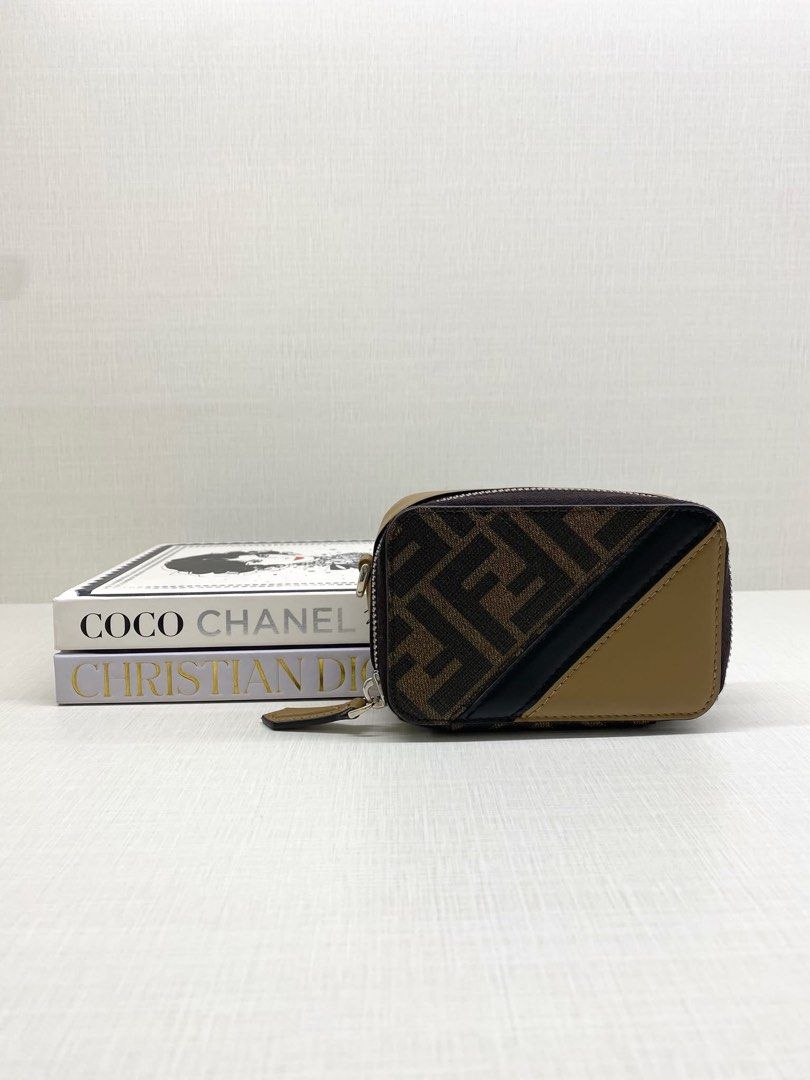 Fendi mini sling compact wallet (Category: Luxury Bags & Wallets) located in Lipa City. Submitted by curated.luxury (Listing ID 1466891185, Image 2). Description: Disclaimer: We are an independent reseller. We are not affiliated with or officially connected to the brand mentioned above. All trademarks belong to their respective owners. 100% Authentic, Money back guarantee We accept Credit Card, Cash and Bank Transfers We have physical store locat