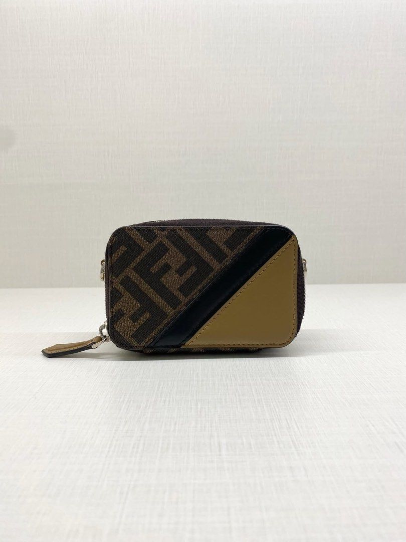 Fendi mini sling compact wallet (Category: Luxury Bags & Wallets) located in Lipa City. Submitted by curated.luxury (Listing ID 1466891185, Image 3). Description: Disclaimer: We are an independent reseller. We are not affiliated with or officially connected to the brand mentioned above. All trademarks belong to their respective owners. 100% Authentic, Money back guarantee We accept Credit Card, Cash and Bank Transfers We have physical store locat