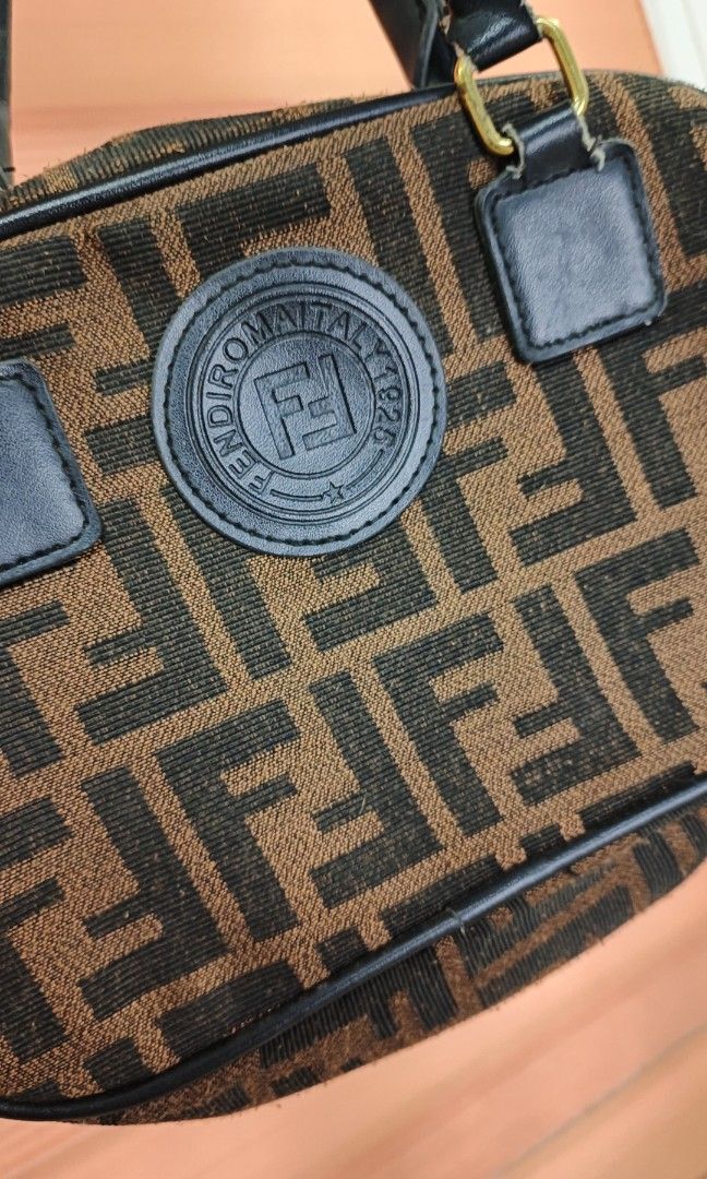 Fendi Zucca Monogram Hand Bag (Category: Purses & Pouches) located in Cabuyao City. Submitted by dthrifts (Listing ID 1466851700, Image 2). Description: 9.5 W 7 L Missing Sling Strap Used Condition.