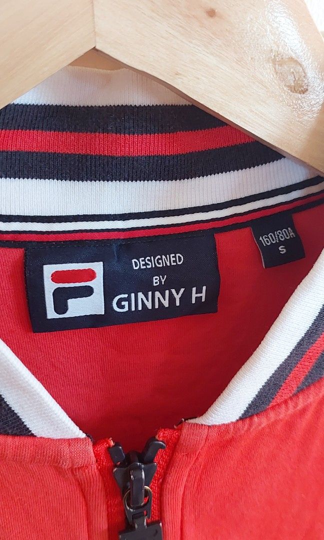 Fila track jacket (Category: Activewear) located in Pozorrubio. Submitted by infinite_grind_0.1 (Listing ID 1466817615, Image 2). Description: 285 This is a red Fila track jacket with white-and-navy-blue striped ribbing, similar to the classic Fila Settanta design on tape: chest 16 length 21.