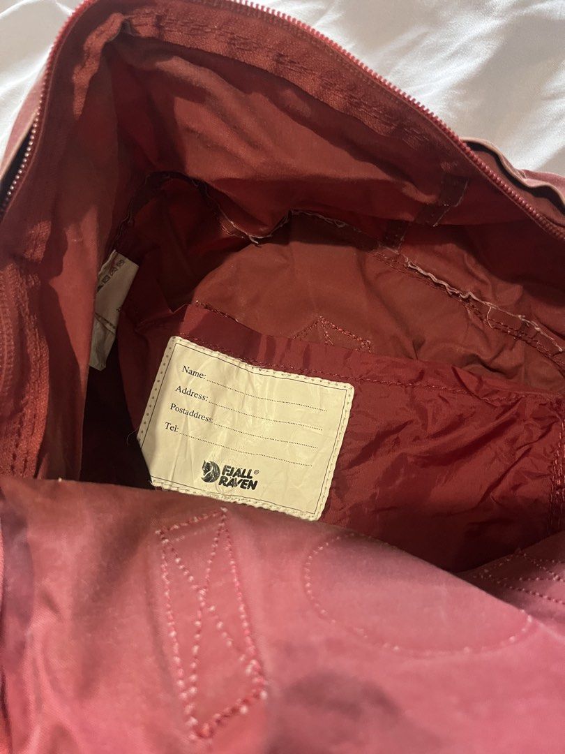 Fjallraven Kanken Backpack Ox Red (Category: Backpacks) located in Manila. Submitted by totiitot (Listing ID 1466865555, Image 2). Description: Please Read: - Color: Ox Red - Condition: Pre-loved with visible wear marks no logo in front so please manage your expectations this is well loved - Features: Dual top carry handles, adjustable shoulder straps, front zipped pocket, main zipped compartment, and interior name tag patch - Design: Classic box