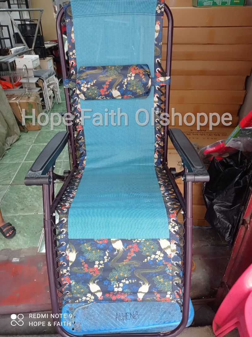 Foldable Zero Gravity Recliner Lounge Chair with Pillow (Category: Chairs) located in Manila. Submitted by jamfrimzy089458 (Listing ID 1466788821, Image 1). Description: - Versatile indoor & outdoor lounge chair (great for patio, balcony, garden, or camping) - Sturdy metal frame with durable bungee suspension cords - Breathable mesh fabric seat and backrest for maximum comfort - Includes a matching, comfy headrest pillow - Adjustable reclining po