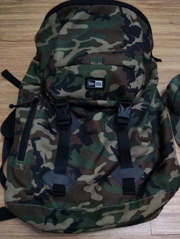 for sale New Era Camo Backpack (Category: Caps & Hats) located in Mandaluyong City. Submitted by derekalava (Listing ID 1463518636, Image 2). Description: for sale New Era Camo Backpack for sale Brand new New Era camouflage backpack - Spacious interior for all your essentials - Adjustable straps for maxi mum comfort if interested please call txt or pm me see pics for the condition thank you.