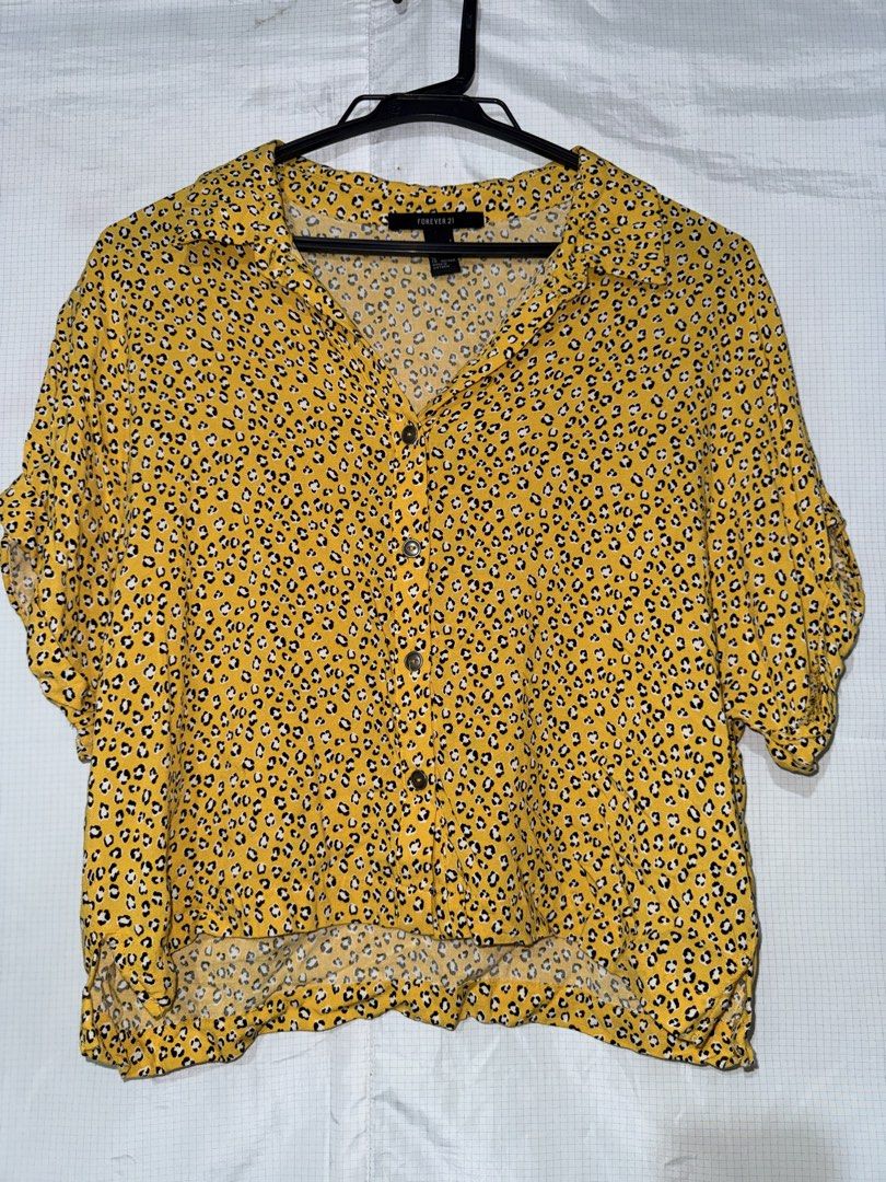 forever 21 yellow leopard print blouse (Category: Blouses) located in Quezon City. Submitted by riexomt (Listing ID 1466869214, Image 1). Description: - Forever 21 - short sleeve button-down blouse - black and white cheetah print on bright yellow - relaxed fit loose collared neckline, 4 brown front buttons - lightweight & presko.
