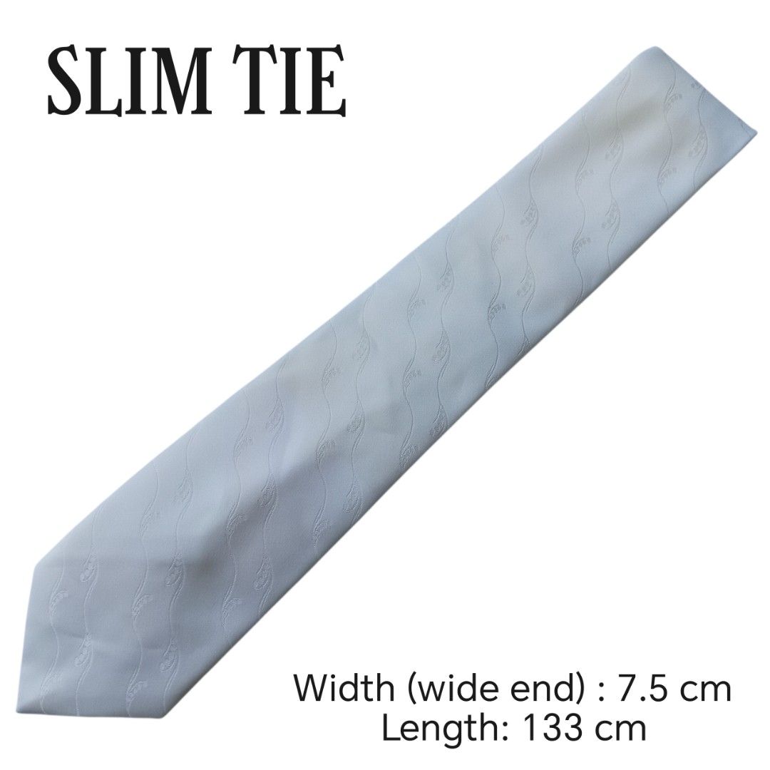 Formal white Neck tie (Category: Ties) located in Abucay. Submitted by gibzzz123 (Listing ID 1466815824, Image 2). Description: • All items are ON HAND and ready to be shipped/picked up. • Items are preloved/ukay, so please expect minimal signs of usage unless stated otherwise. • No major issues — good condition unless otherwise indicated in the listing. • Actual color may slightly vary due to lighting and screen settings. • All available photos 