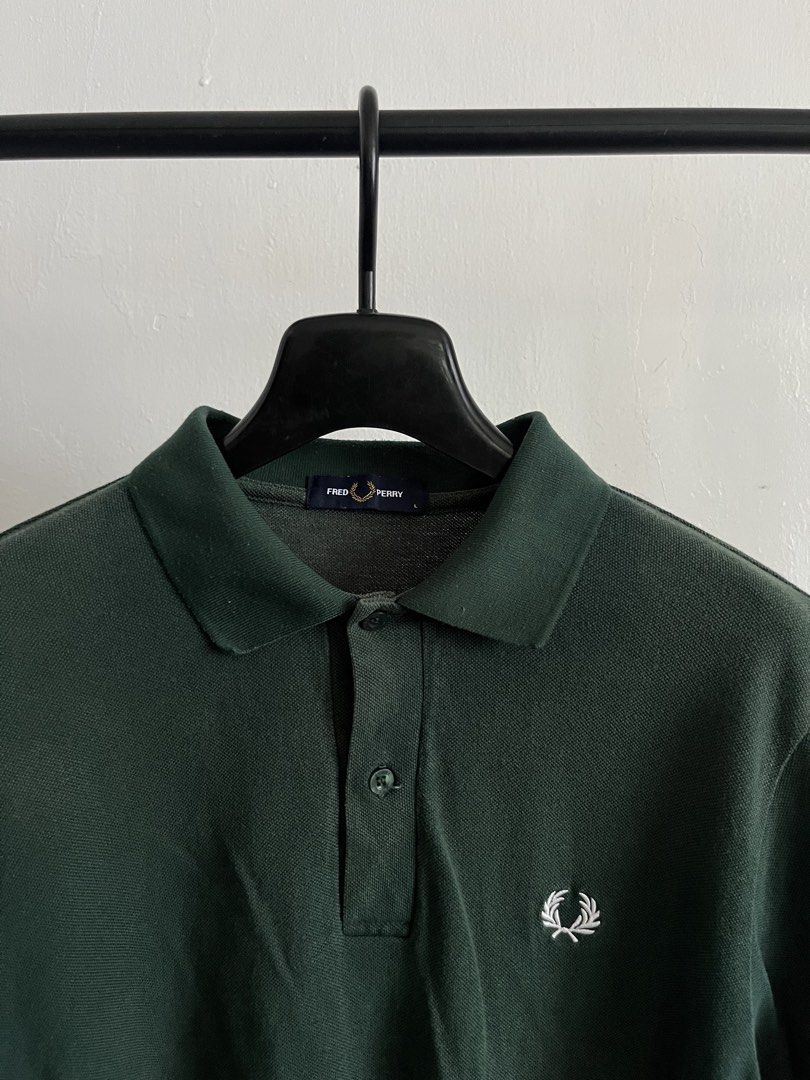 Fred Perry (Category: Tshirts & Polo Shirts ) located in Virac. Submitted by _thecave (Listing ID 1466833553, Image 2). Description: Fred perry Very good 9/10 Color Rate Sign of use Tagged Size: L Width: 20 Length: 26 P550 + SF .