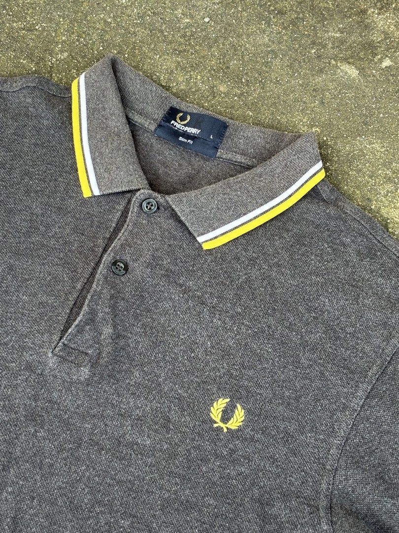 Fred Perry Polo shirt (Category: Formal Shirts) located in Manila. Submitted by luxstreetwearzcasual (Listing ID 1466823200, Image 2). Description: Excellent condition (like new) Crispy 20.5” width 28” length Authentic.