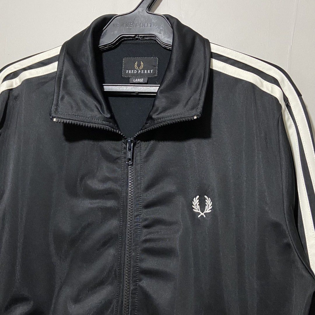 Fred Perry Track Jacket (Category: Luxury Apparel) located in Cebu City. Submitted by kibinilats (Listing ID 1466888429, Image 2). Description: Fred Perry Track Jacket Excellent condition Size Large 21.5x27 Pm.