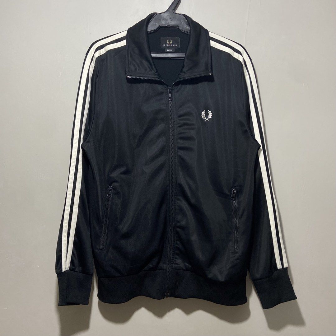 Fred Perry Track Jacket (Category: Luxury Apparel) located in Cebu City. Submitted by kibinilats (Listing ID 1466888429, Image 1). Description: Fred Perry Track Jacket Excellent condition Size Large 21.5x27 Pm.