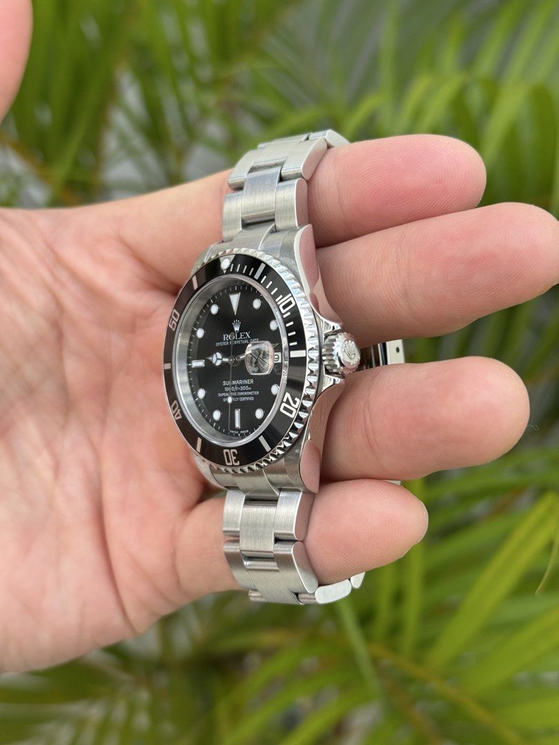 FS/FT: Rolex Submariner Date 16610T (Category: Luxury Watches) located in Quezon City. Submitted by limnicolejj (Listing ID 1466792720, Image 3). Description: Clean and iconic Rolex Submariner Date 16610T 40mm Caliber 3135 06 D serial Used (9.5/10) Watch with full links, box, manuals, hangtag and authentication from Panotes 518,000.00 Slightly negotiable .