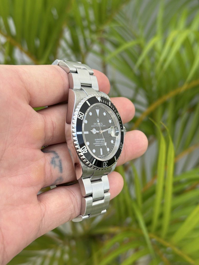 FS/FT: Rolex Submariner Date 16610T (Category: Luxury Watches) located in Quezon City. Submitted by limnicolejj (Listing ID 1466792720, Image 2). Description: Clean and iconic Rolex Submariner Date 16610T 40mm Caliber 3135 06 D serial Used (9.5/10) Watch with full links, box, manuals, hangtag and authentication from Panotes 518,000.00 Slightly negotiable .