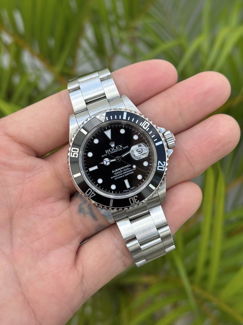 FS/FT: Rolex Submariner Date 16610T (Category: Luxury Watches) located in Quezon City. Submitted by limnicolejj (Listing ID 1466792720, Image 1). Description: Clean and iconic Rolex Submariner Date 16610T 40mm Caliber 3135 06 D serial Used (9.5/10) Watch with full links, box, manuals, hangtag and authentication from Panotes 518,000.00 Slightly negotiable .