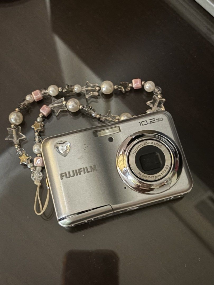 Fujifilm FinePix A170 Digicam (Category: Cameras) located in Quezon City. Submitted by alex.c_1 (Listing ID 1466790702, Image 1). Description: - Model: FujiFilm FinePix A170 - Resolution: 10.2 Megapixels - Condition: Normal signs of handling on the body, LCD screen works perfectly - Vibe: Perfect Y2K aesthetic pocket camera for daily snapshots and OOTDs.