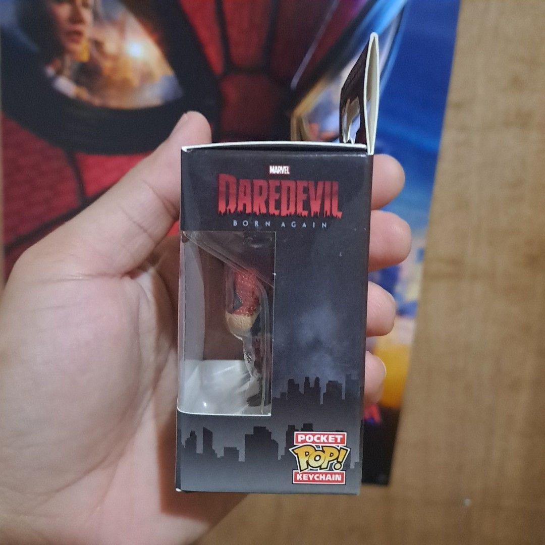 Funko Pocket POP! Keychain Daredevil (Category: Western Merchandise) located in Manila. Submitted by free_joe (Listing ID 1466806182, Image 2). Description: - Official Marvel merchandise - Character: Daredevil (Born Again) - Type: Funko Pocket Pop Keychain - Condition: Brand new, unopened in original window display box - Perfect collectible for Marvel fans - Can be attached to keys, bags, or backpacks.